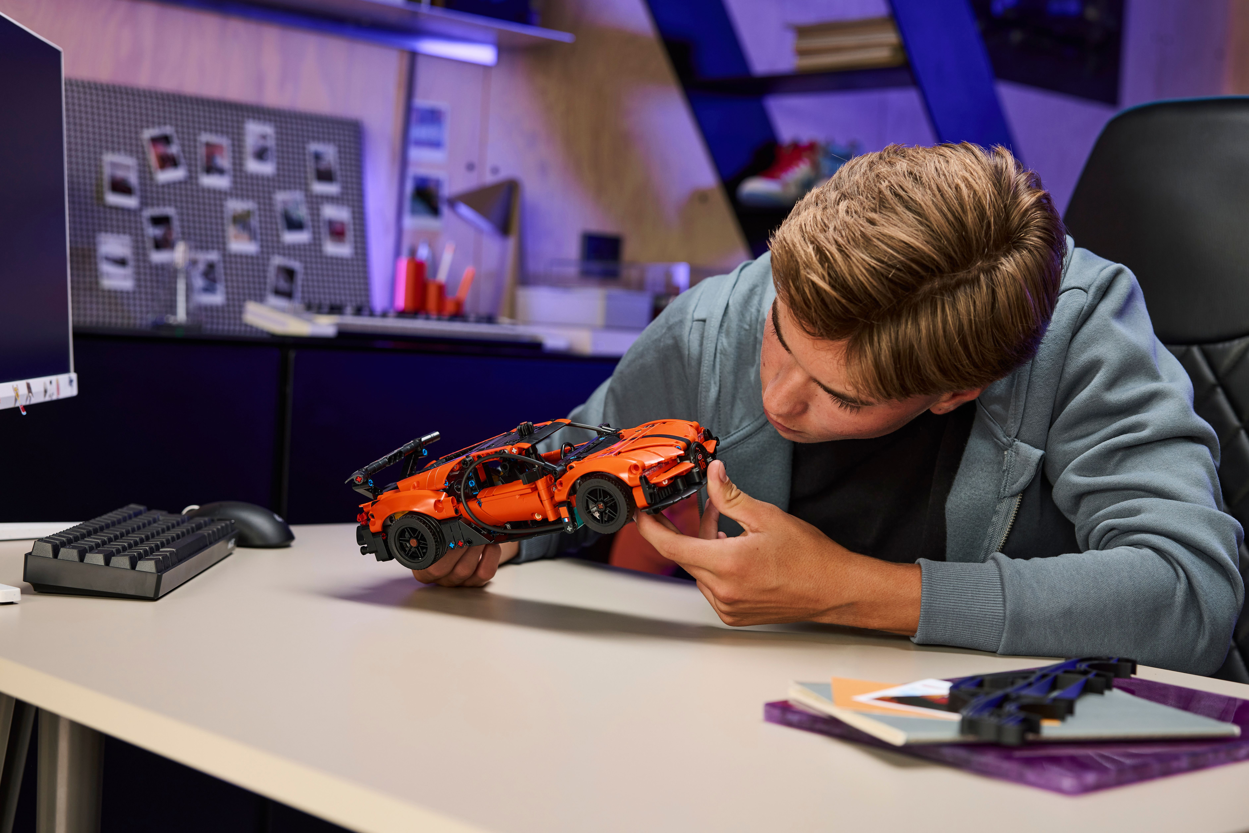 The LEGO® Technic™ Bugatti Chiron Pur Sport captures the car’s distinctive character with its vibrant orange and black bodywork.